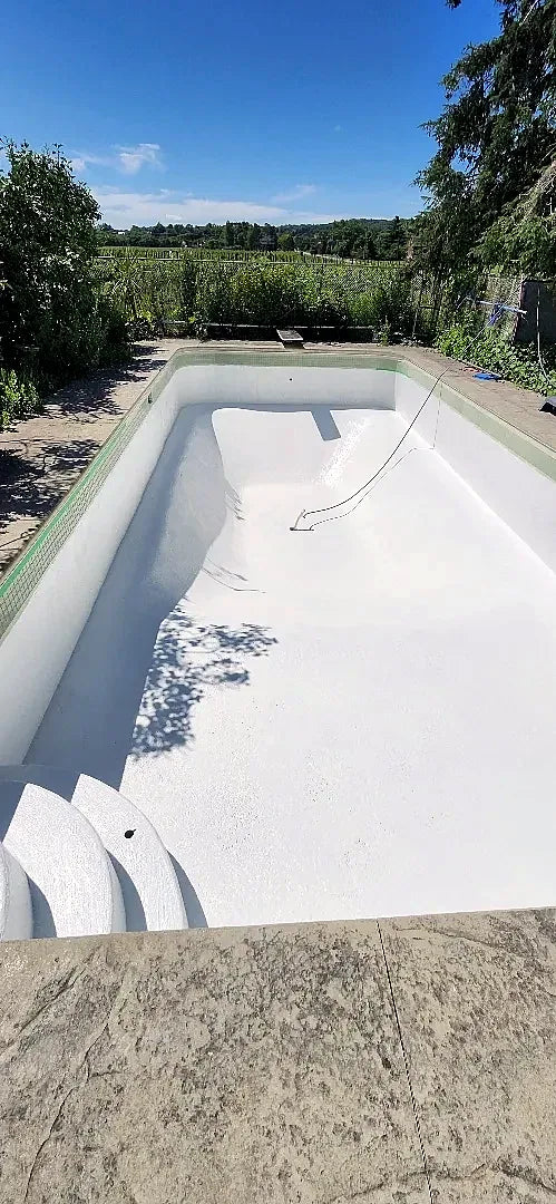 Long view of the pool refinished in white